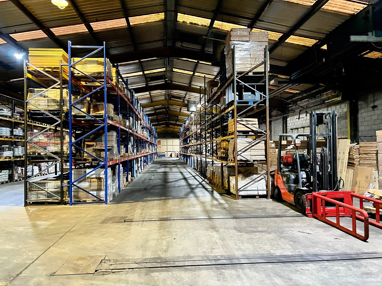 Deep perspective of loaded pallet racking aisles at Laporsa warehouse